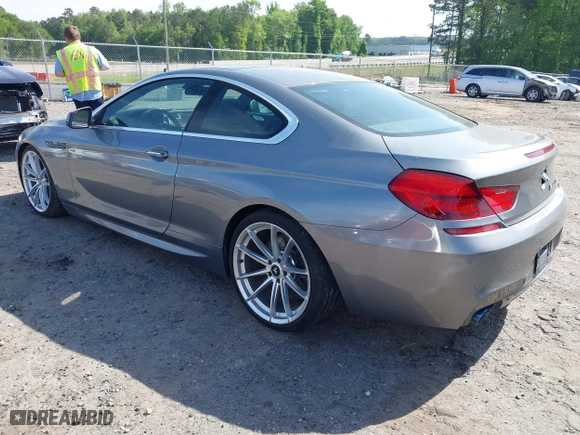 2012 BMW 6 Series 650i with VIN WBALX3C5XCC528484, listed as a IAAI auction lot 42080063 with 120,995 mi miles. Bid and sale history available at carsss.com. Image 3.