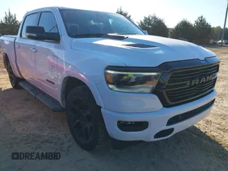 2021 Ram 1500 Laramie with VIN 1C6SRFJT7MN610617, listed as a IAAI auction lot 41866139 with 51,005 mi miles and . Bid and sale history available at DreamBid. Image 1.