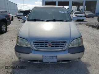 2003 Kia Sedona LX with VIN KNDUP131236453481, listed as a Copart auction lot 75660244 with 125,628 mi miles and Salvage Title. Bid and sale history available at carsss.com. Image 5.