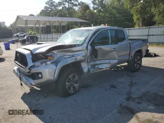 2017 Toyota Tacoma SR5 with VIN 5TFAZ5CN4HX023461, listed as a Copart auction lot 61161815 with 151,879 mi miles and Salvage title. Bid and sale history available at DreamBid. Image 1.