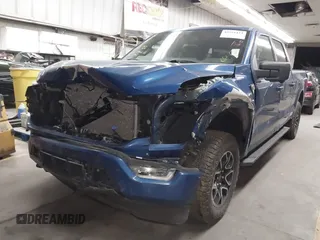 2022 Ford F-150 XL with VIN 1FTFW1E82NKE39483, listed as a IAAI auction lot 42591423 with 51,701 mi miles and . Bid and sale history available at DreamBid. Image 2.
