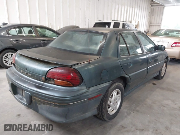 1998 Pontiac Grand Am SE with VIN 1G2NE52T1WC768383, listed as a IAAI auction lot 42220195 with 275,908 mi miles and . Bid and sale history available at DreamBid. Image 4.