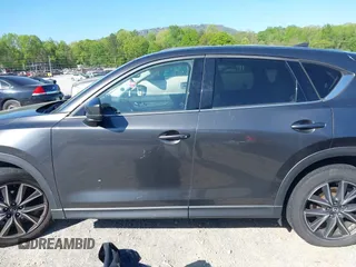 2018 Mazda CX-5 Grand Touring with VIN JM3KFBDM7J0454836, listed as a IAAI auction lot 42001397 with 146,879 mi miles. Bid and sale history available at carsss.com. Image 14.