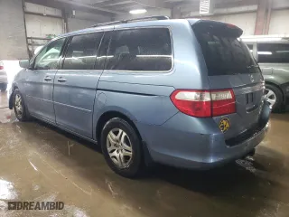 2005 Honda Odyssey EX-L with VIN 5FNRL38775B133803, listed as a Copart auction lot 51826685 with 141,867 mi miles and Salvage Title. Bid and sale history available at carsss.com. Image 2.