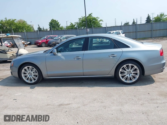 2013 Audi A8 4.0L with VIN WAUA2AFD5DN021950, listed as a IAAI auction lot 42472512 with 126,964 mi miles and . Bid and sale history available at DreamBid. Image 14.