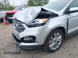 2019 Ford Edge Titanium with VIN 2FMPK4K99KBB56336, listed as a IAAI auction lot 42282600 with 52,422 mi miles and . Bid and sale history available at DreamBid. Image 6.