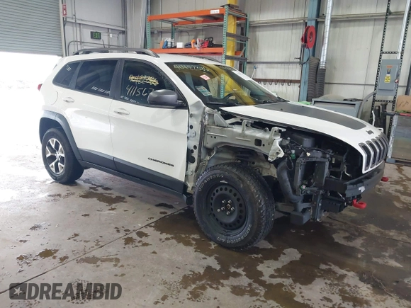 2016 Jeep Cherokee Trailhawk z VIN 1C4PJMBS6GW242123, wystawiony jako IAAI lot #41156712 z przebiegiem 136 596 mil mil oraz . Historia ofert i sprzedaży dostępna na DreamBid. Obrazek 1.