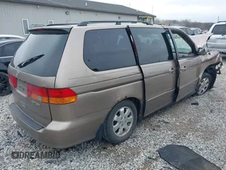 2004 Honda Odyssey EX z VIN 5FNRL18634B004127, wystawiony jako IAAI lot #41854878 z przebiegiem 242 601 mil mil oraz . Historia ofert i sprzedaży dostępna na DreamBid. Obrazek 4.