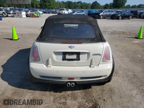 2006 MINI Convertible S с VIN WMWRH33546TF85908, выставлен на аукционе Copart как лот 61363025 с пробегом 105 053 миль миль и Списание • Salvage title. История ставок и продаж доступна на DreamBid. Изображение 6.