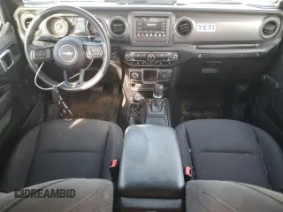 2023 Jeep Wrangler Sport with VIN 1C4HJXDN7PW530536, listed as a Copart auction lot 69664634 with 16,816 mi miles and Salvage Title. Bid and sale history available at DreamBid. Image 8.