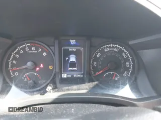 2022 Toyota Tacoma SR z VIN 3TYAX5GN5NT046897, wystawiony jako IAAI lot #42253604 z przebiegiem 69 246 mil mil oraz . Historia ofert i sprzedaży dostępna na DreamBid. Obrazek 7.