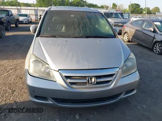 2007 Honda Odyssey EX-L z VIN 5FNRL38677B449602, wystawiony jako IAAI lot #42030774 z przebiegiem 179 563 mil mil oraz . Historia ofert i sprzedaży dostępna na DreamBid. Obrazek 6.
