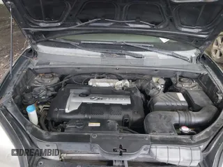 2005 Hyundai Tucson GL with VIN KM8JM12B75U072080, listed as a IAAI auction lot 41779464 with 191,771 mi miles. Bid and sale history available at carsss.com. Image 10.