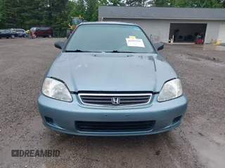 2000 Honda Civic VP z VIN 2HGEJ6612YH575604, wystawiony jako IAAI lot #42395535 z przebiegiem 164 185 mil mil oraz . Historia ofert i sprzedaży dostępna na DreamBid. Obrazek 12.
