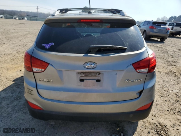 2013 Hyundai Tucson GLS with VIN KM8JU3AC1DU663090, listed as a Copart auction lot 48874295 with 0 mi miles and Salvage Title. Bid and sale history available at carsss.com. Image 6.