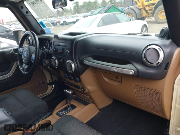 2012 Jeep Wrangler Arctic с VIN 1C4AJWBG1CL103607, выставлен на аукционе IAAI как лот 42004802 с пробегом 72 030 миль миль и . История ставок и продаж доступна на DreamBid. Изображение 5.