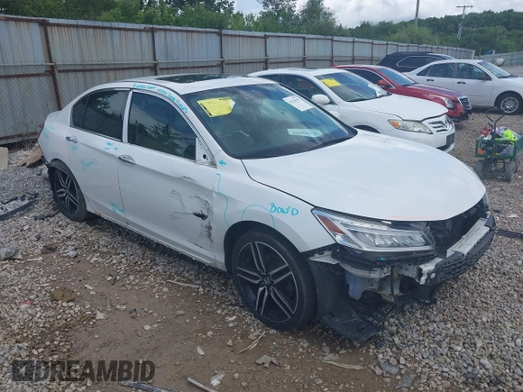 2017 Honda Accord Touring with VIN 1HGCR3F98HA003410, listed as a IAAI auction lot 42534659 with 211,470 mi miles and . Bid and sale history available at DreamBid. Image 1.