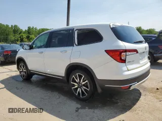 2022 Honda Pilot Elite with VIN 5FNYF6H08NB059590, listed as a Copart auction lot 57460235 with 67,593 mi miles and Salvage title. Bid and sale history available at DreamBid. Image 2.