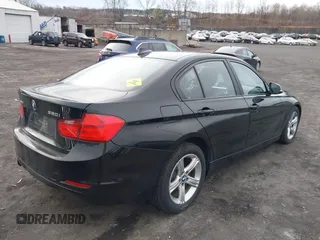 2014 BMW 3 Series 320i xDrive with VIN WBA3C3G59ENS70388, listed as a IAAI auction lot 41962815 with 195,393 mi miles. Bid and sale history available at carsss.com. Image 4.