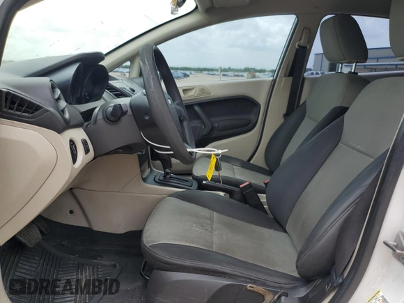 2012 Ford Fiesta S with VIN 3FADP4AJXCM123663, listed as a Copart auction lot 54307665 with 129,801 mi miles and Salvage Title. Bid and sale history available at DreamBid. Image 7.