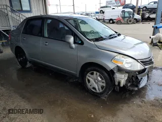 2011 Nissan Versa S with VIN 3N1BC1AP3BL404551, listed as a Copart auction lot 51977085 with 207,070 mi miles and Salvage title. Bid and sale history available at DreamBid. Image 4.