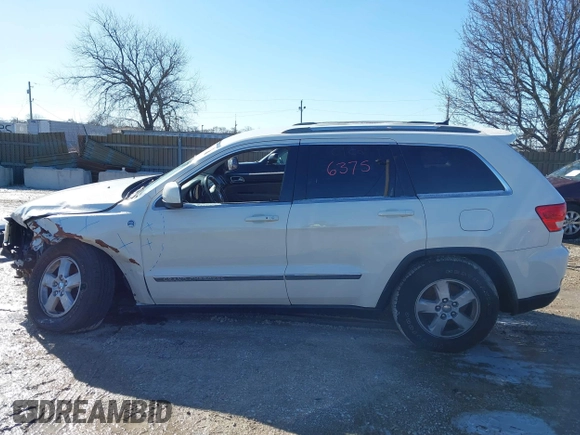 2012 Jeep Grand Cherokee Laredo with VIN 1C4RJFAGXCC224138, listed as a IAAI auction lot 41736375 with 133,383 mi miles. Bid and sale history available at carsss.com. Image 15.