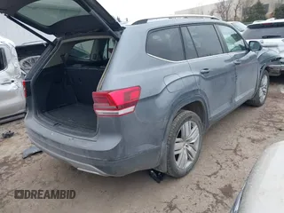 2019 Volkswagen Atlas SE with VIN 1V2WR2CA2KC581212, listed as a IAAI auction lot 41631619 with 122,160 mi miles and . Bid and sale history available at DreamBid. Image 4.