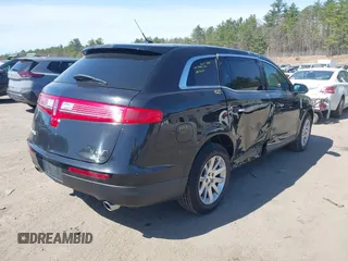 2019 Lincoln MKT with VIN 2LMHJ5NK2KBL03273, listed as a IAAI auction lot 42071546 with 255,186 mi miles and . Bid and sale history available at DreamBid. Image 4.