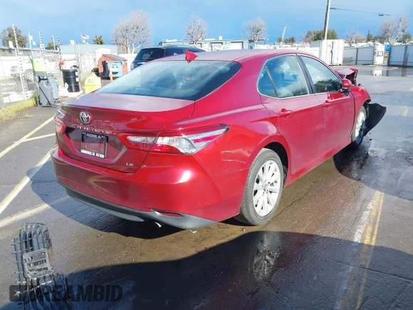 2020 Toyota Camry LE with VIN 4T1C11AK4LU916494, listed as a IAAI auction lot 41786429 with 100,032 mi miles and . Bid and sale history available at DreamBid. Image 4.