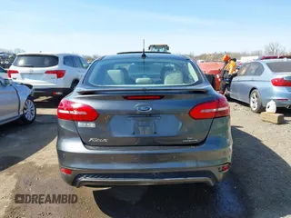 2015 Ford Focus SE with VIN 1FADP3F29FL268677, listed as a IAAI auction lot 42037244 with 118,018 mi miles. Bid and sale history available at carsss.com. Image 17.