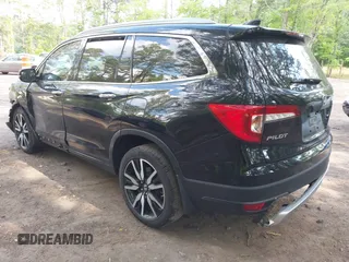 2019 Honda Pilot Touring 7-Passenger with VIN 5FNYF6H60KB030990, listed as a IAAI auction lot 42160762 with 68,807 mi miles and . Bid and sale history available at DreamBid. Image 3.