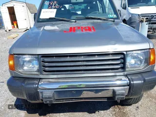 1993 Mitsubishi Montero z VIN JA4MR41H4PJ007602, wystawiony jako IAAI lot #41832401 z przebiegiem 191 549 mil mil oraz . Historia ofert i sprzedaży dostępna na DreamBid. Obrazek 6.