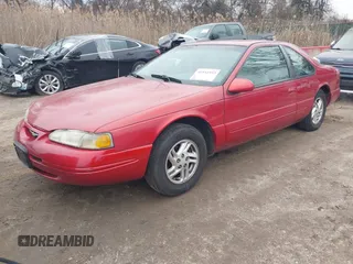 1997 Ford Thunderbird LX with VIN 1FALP6248VH134894, listed as a IAAI auction lot 41551957 with 136,435 mi miles and . Bid and sale history available at DreamBid. Image 2.