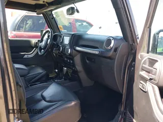 2018 Jeep Wrangler JK Unlimited Altitude with VIN 1C4BJWEG9JL802853, listed as a IAAI auction lot 41993420 with 51,742 mi miles. Bid and sale history available at carsss.com. Image 5.