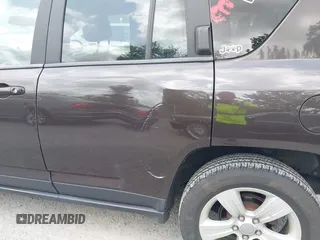 2014 Jeep Compass Latitude with VIN 1C4NJDEBXED622352, listed as a IAAI auction lot 42130403 with 149,024 mi miles. Bid and sale history available at carsss.com. Image 14.