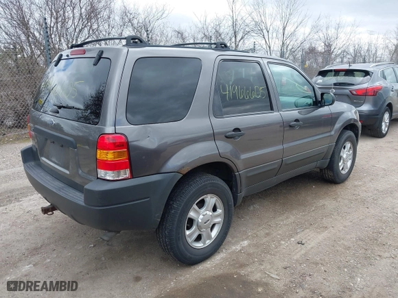 2003 Ford Escape XLT Popular 2 with VIN 1FMYU93103KA39840, listed as a IAAI auction lot 41966605 with 141,321 mi miles. Bid and sale history available at carsss.com. Image 4.