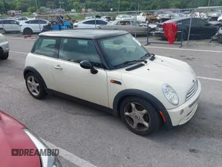 2006 MINI Hardtop with VIN WMWRC33566TK73763, listed as a IAAI auction lot 42782654 with 103,751 mi miles and . Bid and sale history available at DreamBid. Image 1.