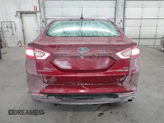 2014 Ford Fusion SE Hybrid with VIN 3FA6P0LU5ER136237, listed as a IAAI auction lot 41590088 with 174,009 mi miles. Bid and sale history available at carsss.com. Image 16.