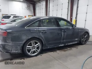 2016 Audi A6 Premium Plus z VIN WAUGFAFCXGN104249, wystawiony jako IAAI lot #41631393 z przebiegiem 117 516 mil mil oraz . Historia ofert i sprzedaży dostępna na DreamBid. Obrazek 13.