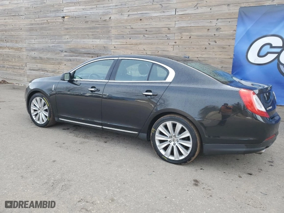 2014 Lincoln MKS EcoBoost with VIN 1LNHL9FT9EG607363, listed as a Copart auction lot 87765345 with 121,615 mi miles and Clean Title. Bid and sale history available at carsss.com. Image 2.