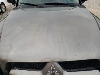 2006 Mitsubishi Raider Duro Cross z VIN 1Z7HC38K76S537788, wystawiony jako Copart lot #63922994 z przebiegiem 331 015 mil mil oraz Nie do naprawy • Non repairable. Historia ofert i sprzedaży dostępna na DreamBid. Obrazek 11.