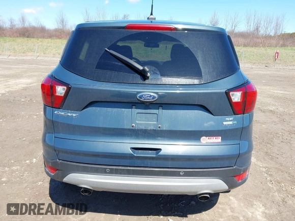 2019 Ford Escape SE z VIN 1FMCU9GDXKUC06609, wystawiony jako IAAI lot #42061974 z przebiegiem 148 064 mil mil oraz . Historia ofert i sprzedaży dostępna na DreamBid. Obrazek 16.