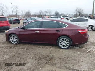 2015 Toyota Avalon Limited with VIN 4T1BK1EB7FU167777, listed as a IAAI auction lot 41457339 with 98,239 mi miles and . Bid and sale history available at DreamBid. Image 14.
