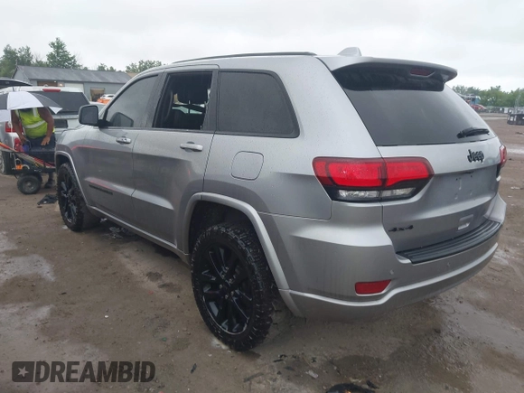 2018 Jeep Grand Cherokee Laredo E with VIN 1C4RJFAG6JC452859, listed as a IAAI auction lot 42647127 with 107,869 mi miles and . Bid and sale history available at DreamBid. Image 3.