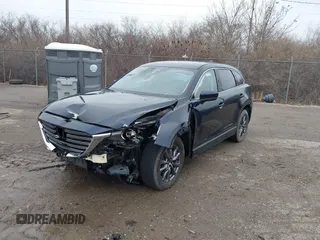 2021 Mazda CX-9 Touring z VIN JM3TCBCY4M0520362, wystawiony jako IAAI lot #41193396 z przebiegiem 17 323 mil mil oraz . Historia ofert i sprzedaży dostępna na DreamBid. Obrazek 2.