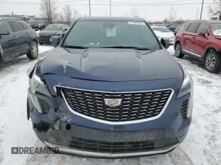 2022 Cadillac XT4 AWD Premium Luxury with VIN 1GYFZDR45NF153100, listed as a Copart auction lot 47483535 with 46,616 mi miles and Salvage Title. Bid and sale history available at carsss.com. Image 5.