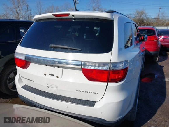 2012 Dodge Durango Citadel with VIN 1C4SDHET4CC180732, listed as a IAAI auction lot 41872508 with 127,081 mi miles and . Bid and sale history available at DreamBid. Image 16.