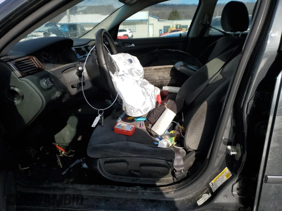 2014 Chevrolet Impala LS z VIN 2G1WA5E32E1186037, wystawiony jako Copart lot #43812615 z przebiegiem Nie podano mil oraz Szkoda całkowita • Salvage title. Historia ofert i sprzedaży dostępna na DreamBid. Obrazek 7.