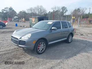 2006 Porsche Cayenne Turbo with VIN WP1AC29P16LA90966, listed as a IAAI auction lot 41498849 with 147,414 mi miles. Bid and sale history available at carsss.com. Image 2.