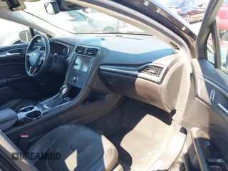 2013 Ford Fusion Titanium Hybrid with VIN 3FA6P0RU2DR288773, listed as a IAAI auction lot 41803708 with 85,868 mi miles and . Bid and sale history available at DreamBid. Image 5.